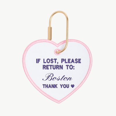 Heart-shaped keychain with text 'If lost, please return to: Boston' on a white background