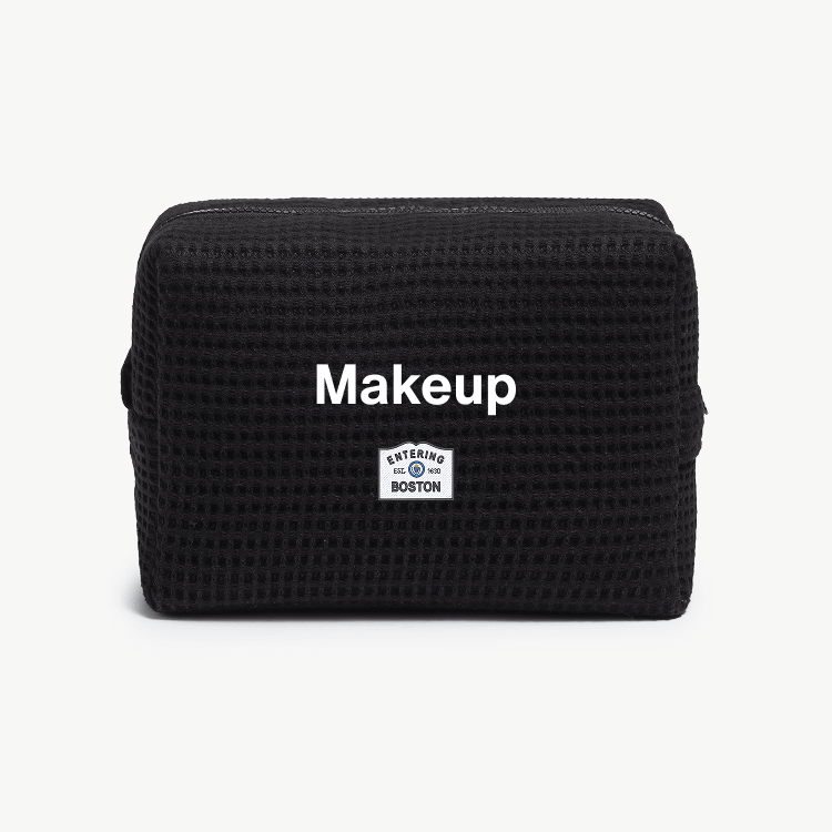 Black bag with 'Makeup' text on a white background