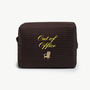 Brown textured pouch with 'Out of Office' text and chair icon on a white background