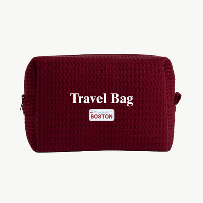 Maroon travel bag with 'Travel Bag' text and 'Boston' label on a white background
