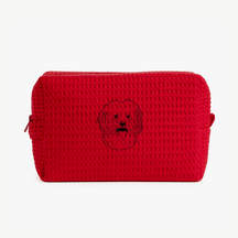 A red waffle zippered pouch with a black line drawing of a dogs face on the front.