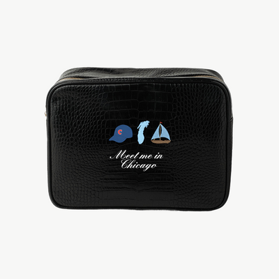Black toiletry bag with 'Meet me in Chicago' design on a white background