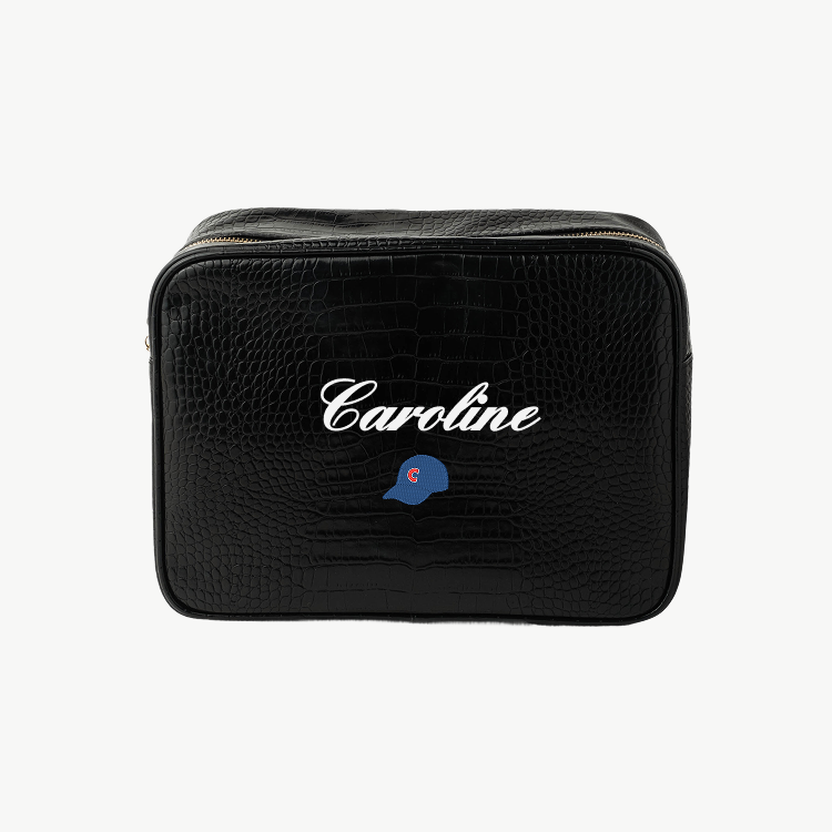 Black textured bag with 'Caroline' and a logo on a white background