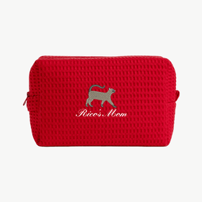 red waffle pouch with embroidered cat's name + "mom" text and cat icon