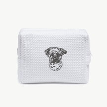 A white waffle zippered pouch with a black line drawing of a dogs face on the front.