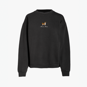 Black crewneck sweatshirt featuring a small embroidered brown dog above the words Max's Mom in white script on the chest. The sweatshirt has long sleeves and a simple, relaxed design.