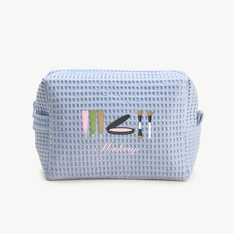 Blue textured makeup bag with 'Makeup' text and icons on a white background