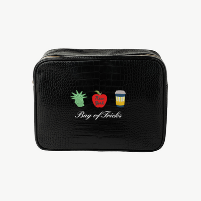 Black toiletry bag with 'Meet me in Lake Michigan' design on a white background