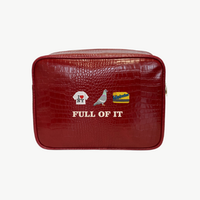 Red crocodile-patterned pouch with icons and text on a white background