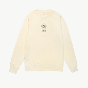 Cream sweatshirt with a dog illustration and 'Bella' text on a white background