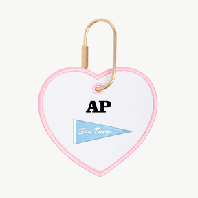 Heart-shaped keychain with 'AP' and 'San Diego' text on a white background