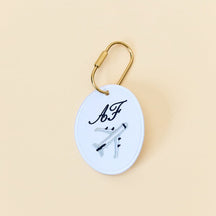 Signature Oval Charm