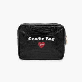 Black goodie bag with 'Goodie Bag Dallas' text and heart design on a white background