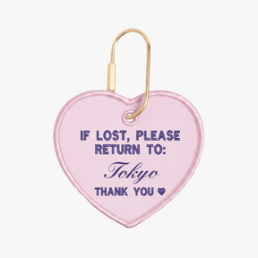 Heart-shaped keychain with text 'If lost, please return to: Tokyo' on a white background
